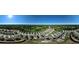 Expansive new community of homes surrounded by trees and landscaping under a sunny sky at 1730 Fulmont Cir, Mableton, GA 30126