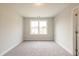 Bedroom with gray carpet, white trim, a single window at 1730 Fulmont Cir, Mableton, GA 30126
