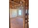 Bedroom with unfinished flooring, insulation, and a window, offering a blank canvas for personalization and design at 1730 Fulmont Cir, Mableton, GA 30126