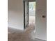 A bright room with a large window, offering ample natural light and a neutral color palette at 1730 Fulmont Cir, Mableton, GA 30126