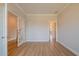 Spacious bonus room with wood floors, crown molding, multiple entry points, and plenty of natural light at 1730 Fulmont Cir, Mableton, GA 30126