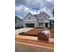 Charming two-story home with a brick and gray siding exterior and attached garage at 1730 Fulmont Cir, Mableton, GA 30126