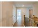 Hallway with wood floors, trim, and doors leading to rooms at 1730 Fulmont Cir, Mableton, GA 30126