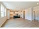 Open concept living space features a modern kitchen with island and pendant lighting, perfect for entertaining at 1730 Fulmont Cir, Mableton, GA 30126