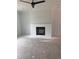 The living room features a white painted brick fireplace and an installed ceiling fan at 1730 Fulmont Cir, Mableton, GA 30126