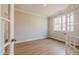 A versatile office space with wood floors, a large window, and glass doors, ideal for work or study at 1730 Fulmont Cir, Mableton, GA 30126