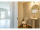 View of powder room with pedestal sink and access to the rest of the home at 1730 Fulmont Cir, Mableton, GA 30126