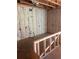 Unfinished room interior featuring exposed framing and insulation, showcasing the potential for customization at 1730 Fulmont Cir, Mableton, GA 30126