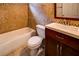 Well-lit bathroom with ceramic tile, vanity and shower/tub at 246 Stafford Nw St, Atlanta, GA 30314