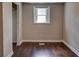 This bedroom features hardwood floors and natural light from the window at 246 Stafford Nw St, Atlanta, GA 30314