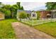 Charming home featuring a picket fence, a concrete driveway, and a well-maintained yard at 246 Stafford Nw St, Atlanta, GA 30314