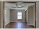 Living room features decorative wood trim, hard wood floors, neutral gray paint and great natural light at 246 Stafford Nw St, Atlanta, GA 30314