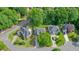 Aerial shot of a residential area showcasing neatly landscaped yards and tree-lined streets at 510 Morning Mist Ct, Alpharetta, GA 30022