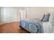 Bedroom featuring hardwood floors, large closet, and natural light at 510 Morning Mist Ct, Alpharetta, GA 30022