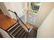 Entryway with a grand staircase, chandelier, and natural light from large windows at 510 Morning Mist Ct, Alpharetta, GA 30022