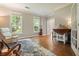 Well-lit office with hardwood floors, comfortable seating, and large windows at 510 Morning Mist Ct, Alpharetta, GA 30022