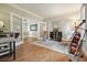 Office area featuring French doors, a chair, and hardwood flooring at 510 Morning Mist Ct, Alpharetta, GA 30022