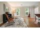 Cozy office featuring hardwood floors, a plush rug, and natural light at 510 Morning Mist Ct, Alpharetta, GA 30022