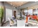 Contemporary dining room featuring a glass table and modern chandelier with views to the city at 943 Peachtree Ne St # 1708, Atlanta, GA 30309