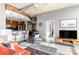 Spacious living area with open kitchen, comfortable seating, and modern decor at 943 Peachtree Ne St # 1708, Atlanta, GA 30309