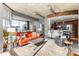 Open concept living room showcasing a modern design with high ceilings and city views at 943 Peachtree Ne St # 1708, Atlanta, GA 30309