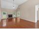 Large living room with high ceilings, hardwood floors, and fireplace at 127 Autumn Run Pl, Villa Rica, GA 30180