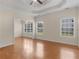 Open-plan living room with hardwood floors and abundant natural light at 127 Autumn Run Pl, Villa Rica, GA 30180