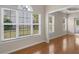 The living room is filled with natural light through large windows at 127 Autumn Run Pl, Villa Rica, GA 30180