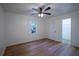 Bedroom with hardwood floors, a ceiling fan, and a closet at 1342 Carter Rd, Decatur, GA 30030