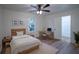 Bright bedroom with modern furniture, light hardwood floors, and natural light at 1342 Carter Rd, Decatur, GA 30030