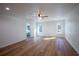 Spacious bedroom with hardwood floors, ceiling fan, recessed lighting, and windows that provide plenty of natural light at 1342 Carter Rd, Decatur, GA 30030