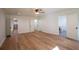 Spacious main bedroom with hardwood floors and three doorways at 1342 Carter Rd, Decatur, GA 30030