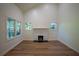 Bright living room with vaulted ceilings, wood floors, and a cozy fireplace, creating an inviting atmosphere at 1342 Carter Rd, Decatur, GA 30030