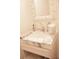 Powder room featuring a marble countertop, decorative mirror and a vessel sink at 1820 Peachtree Nw St # 309, Atlanta, GA 30309