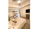 Cozy bedroom with neutral tones, ceiling fan, closet, and TV at 1820 Peachtree Nw St # 309, Atlanta, GA 30309