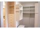Organized walk-in closet with custom shelving and drawers, designed for optimal storage at 1820 Peachtree Nw St # 309, Atlanta, GA 30309