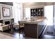 Modern clubhouse with stylish seating, fireplace, and kitchen bar at 1820 Peachtree Nw St # 309, Atlanta, GA 30309