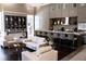 Stylish clubhouse featuring contemporary seating, a bar, and kitchen amenities at 1820 Peachtree Nw St # 309, Atlanta, GA 30309