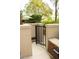 Private access gate with brick detailing and lush landscaping at 1820 Peachtree Nw St # 309, Atlanta, GA 30309