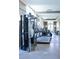 Spacious gym with modern exercise equipment including treadmills and weight machines at 1820 Peachtree Nw St # 309, Atlanta, GA 30309