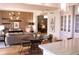 Open-concept living area blending a modern kitchen with a cozy living space and a dining area featuring stylish accents at 1820 Peachtree Nw St # 309, Atlanta, GA 30309
