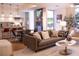 Inviting living area with comfortable seating, modern accents, and seamless access to an outdoor space and gourmet kitchen at 1820 Peachtree Nw St # 309, Atlanta, GA 30309