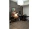 A well-appointed home office features custom millwork, modern lighting, and stylish decor at 1820 Peachtree Nw St # 309, Atlanta, GA 30309