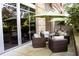 Cozy outdoor patio with comfortable seating under an umbrella at 1820 Peachtree Nw St # 309, Atlanta, GA 30309