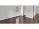 Bright bedroom featuring hardwood floors, large window, and a spacious closet at 2636 Flagstone Se Dr, Atlanta, GA 30316