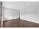 An empty bedroom features hardwood floors, white walls, and recessed lighting at 2636 Flagstone Se Dr, Atlanta, GA 30316