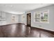 Bright living room with hardwood floors, windows, and a doorway at 2636 Flagstone Se Dr, Atlanta, GA 30316