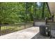 Outdoor patio featuring wood railing and ample space for seating at 2636 Flagstone Se Dr, Atlanta, GA 30316