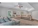 Spacious finished basement with plush seating, providing a great entertainment area at 3860 Overlake Dr, Cumming, GA 30041