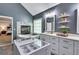 Elegant bathroom featuring a standalone tub, fireplace, and custom vanity at 3860 Overlake Dr, Cumming, GA 30041